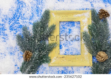 Christmas Picture Frame. Vintage frame and Christmas decoration on old rusty background. Copy space for your text.