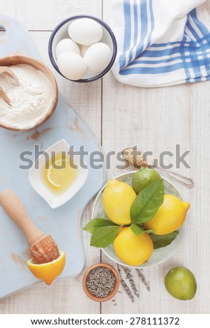 Lemon lavender cake.   High angle view of ingredients in preparation for making lemon lavender cake . Natural light
