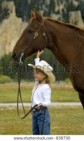 Little Cowgirl and Her Horse