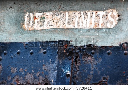 Off Limits - old decaying military bunker painted notice