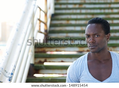 Portrait of an attractive male model looking at camera - copy space