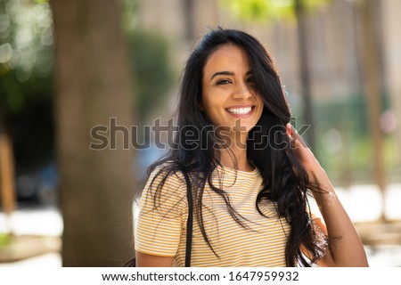 Similar – Image, Stock Photo Summer portrait of long haired teen girl making kissing mouth and showing Victory sign