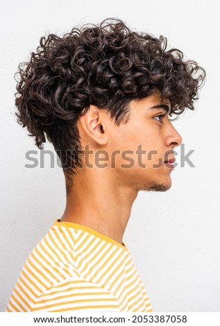 Similar – Image, Stock Photo Side portrait of a young woman with freckles and dimples smiling looking over her shoulder