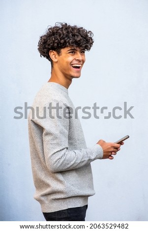 Similar – Image, Stock Photo Side portrait of a young woman with freckles and dimples smiling looking over her shoulder