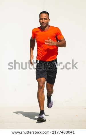 Similar – Image, Stock Photo Black male athlete with basketball on sports court