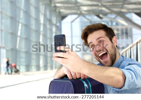 Portrait of a happy man with fun face expression take selfie