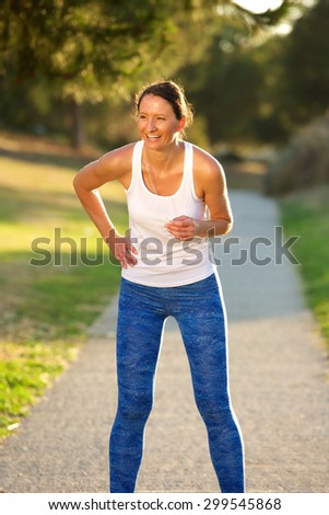 Active older woman relaxing after exercise workout