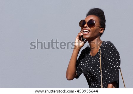 Similar – Image, Stock Photo Stylish black model talking on smartphone on gray background