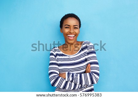 Similar – Image, Stock Photo Confident young black lady in turban looking at camera