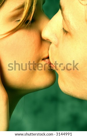 Beautiful couple kissing lips to lips