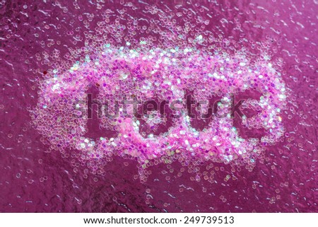 Love letter writen on nail art sticker on pink background,valentine concept