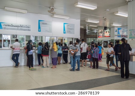 Songkhla, Thailand - 9 Feb,2015 :People stand in line at medical records department at Hatyai hospital, Songkhla on 9 Feb 2015