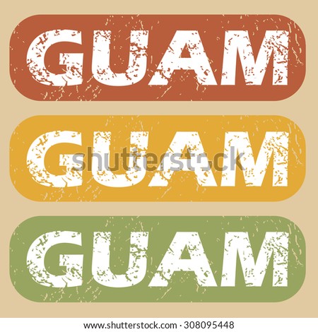 Set of rubber stamps with country name Guam on colored background
