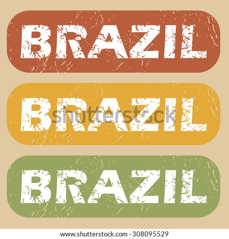 Set of rubber stamps with country name Brazil on colored background