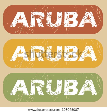 Set of rubber stamps with country name Aruba on colored background