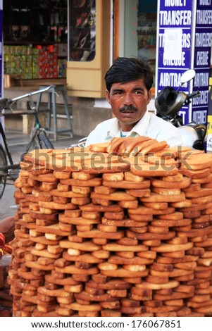 JODHPUR, INDIA - FEBRUARY 11: An unidentified man sells bread at Sadar Market on February 11, 2011 in Jodhpur, India. Jodhpur is the second largest city in the Indian state of Rajasthan.