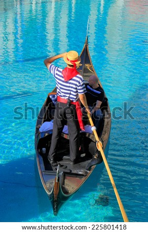 LAS VEGAS, USA - MARCH 19: Unidentified people take gondola ride at Venetian Resort hotel and casino on March 19, 2013 in Las Vegas, USA. Las Vegas is one of the top tourist destinations in the world.