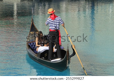 LAS VEGAS, USA - MARCH 19: Unidentified people take gondola ride at Venetian Resort hotel and casino on March 19, 2013 in Las Vegas, USA. Las Vegas is one of the top tourist destinations in the world.