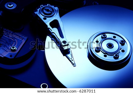 Hard disk detail with a blue hue to accentuate the coldness of technology