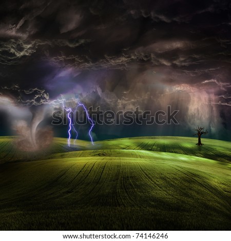 Tornado in stormy landscape