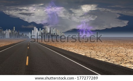 Stormy sky on desert road leading into city