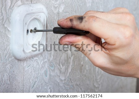 repairing electrical outlet