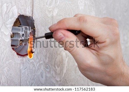 repairing electrical outlet with fired wire