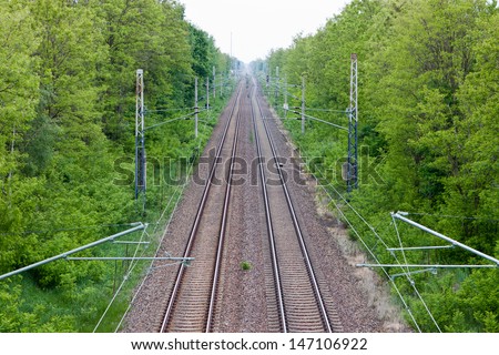 railroad tracks stretching beyond the horizon