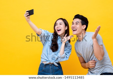 Similar – Image, Stock Photo Delighted teen woman taking selfie on smartphone