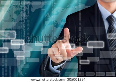 Businessman hand touching empty virtual screen - modern and high tech business background concept