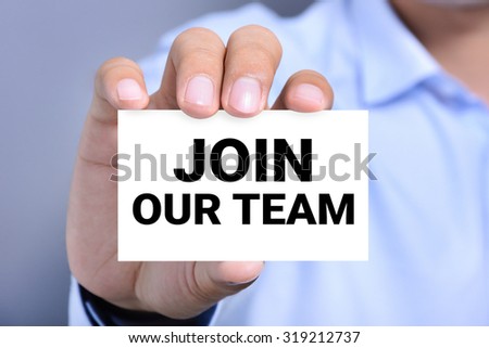 JOIN OUR TEAM, message on the card held by a man hand