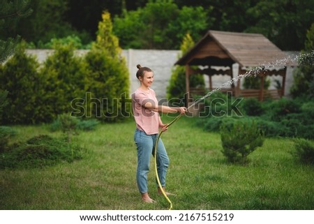 Similar – Image, Stock Photo Woman with water hose