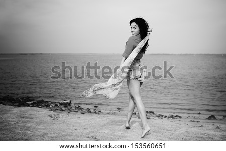 follow me ! sexy young brunette by the sea, black and white