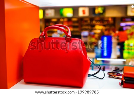 Red fashion bag in store