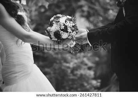 Bridal couple in love, wedding on summer day.  Picture in black and white.