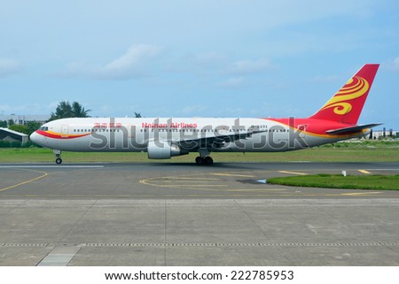 MALE, MALDIVES - SEPTEMBER 4, 2014: A Hainan Airlines Boeing 767 at Ibrahim Nasir International Airport. Hainan Airlines is an airline headquartered in Haikou, People\'s Republic of China.