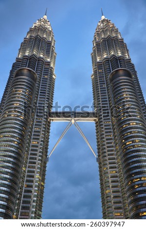 KUALA LUMPUR, MALAYSIA - FEBRUARY 21, 2014: The Petronas Towers are twin skyscrapers. They were the tallest buildings in the world from 1998 to 2004 and remain the tallest twin towers in the world.
