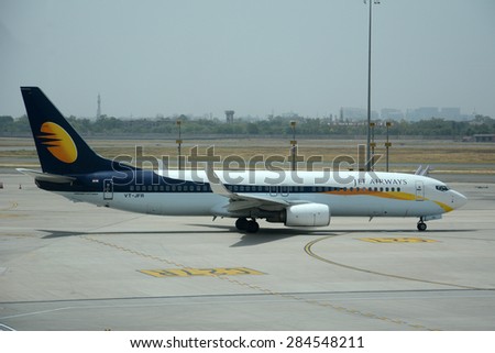 NEW DELHI, INDIA - MAY 24, 2015: A Jet Airways Boeing 737 on the tarmac at Indira Gandhi International Airport. Jet Airways is the second largest Indian airline based in Mumbai.