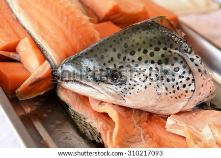 Salmon fish head and fillet Sashimi Seafood in Japan restaurant