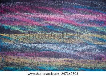Colorful chalk on chalk board abstract background