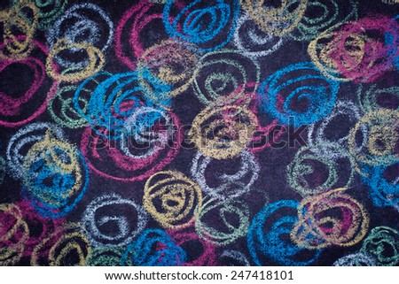 Colorful chalk on chalk board abstract background