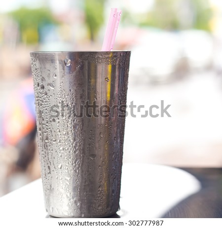 Drink water in metal cup