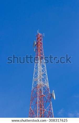 Telecommunication tower on blue sky blank background. Used to transmit television and telephone signal