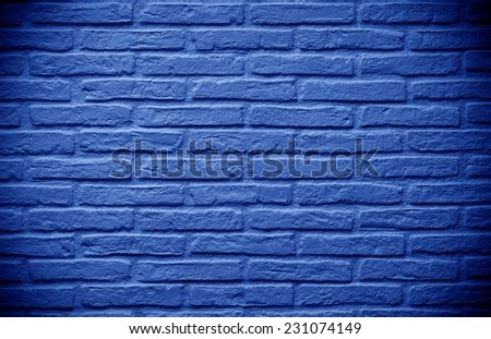 deep blue brick wall background faded on black
