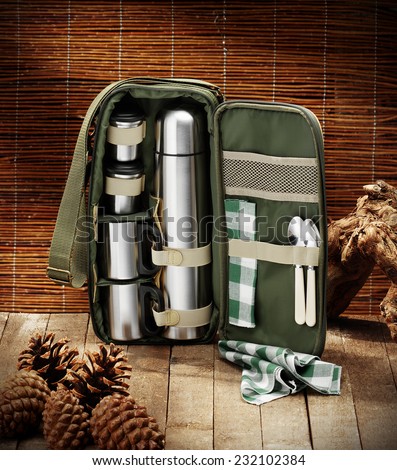 picnic small bag for hunter inside hunting lodge