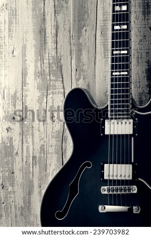 blues guitar on aged wood,vintage style photo