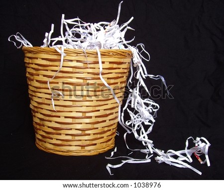 shredded paper in waste basket