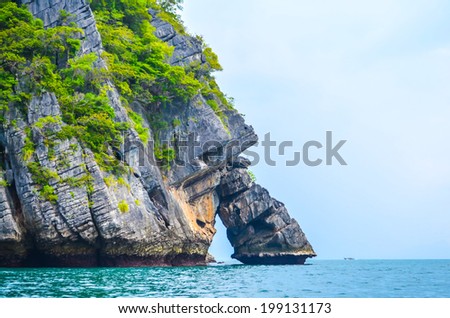 Rock Island and Sea in Krabi Thailand. The rock is collapsed