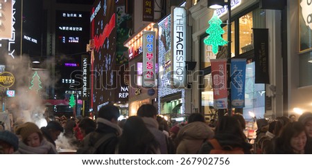 Seoul, Republic of Korea - January 1, 2015 :  Urban scene with crowd people at  shopping street at night  in Seoul ,South Korea.