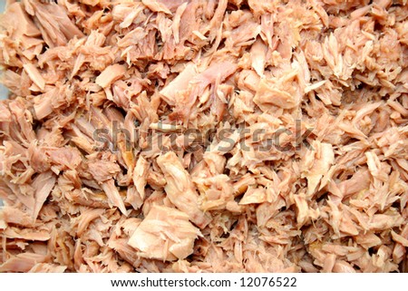 close up abstract photo of flaked tuna fish